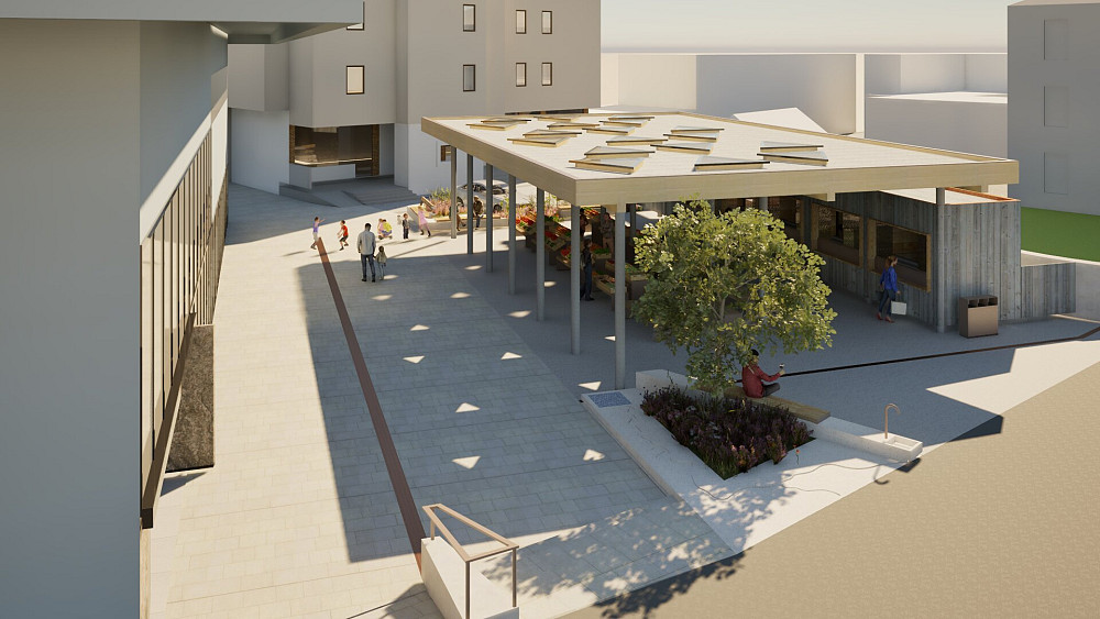 PO PRENOVI BO TOLMINSKA TRŽNICA imela nadstrešek nad odprtim prodajnim prostorom s stojnicami in zaprtimi objekti, urejen bo pripadajoči javni prostor, nova bosta urbana oprema in pitnik.