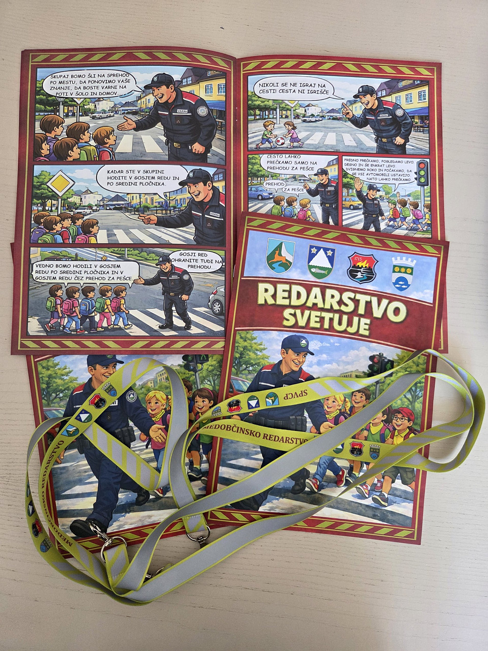 MEDOBČINSKA UPRAVA OBČIN BOVEC, KOBARID, TOLMIN IN KANAL OB SOČI JE ZA VEČJO PROMETNO VARNOST OTROK PRIPRAVILA NOVO POBARVANKO REDARSTVO SVETUJE, s katero bodo osnovnošolci skozi igro, strip, naloge in prometne vsebine utrjevali znanje o varni poti v šolo.